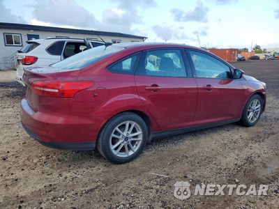 Trzecie zdjęcie samochodu z tyłu: 2017 FORD FOCUS SE VIN:1FADP3F26HL296259 - miniatura