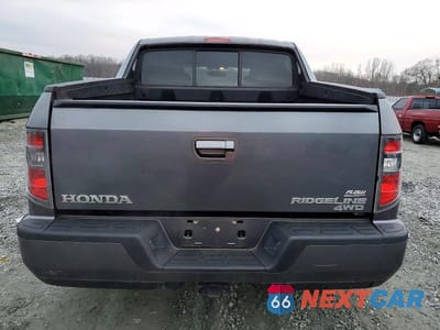 Zdjęcie 6 z 11 samochodu: 2014 HONDA RIDGELINE RTL VIN:5FPYK1F55EB002994 - miniatura