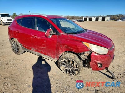 Czwarte zdjęcie samochodu z boku: 2013 HYUNDAI TUCSON GLS VIN:KM8JU3AC8DU743003 - miniatura