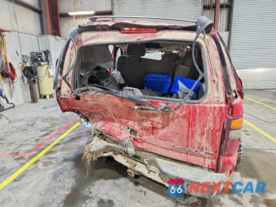 Zdjęcie 6 z 12 samochodu: 2002 CHEVROLET TAHOE C1500 VIN:1GNEC13V32R118219 - miniatura