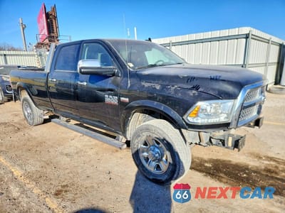 Czwarte zdjęcie samochodu z boku: 2015 RAM 3500 LARAMIE VIN:3C63R3JJXFG580087 - miniatura