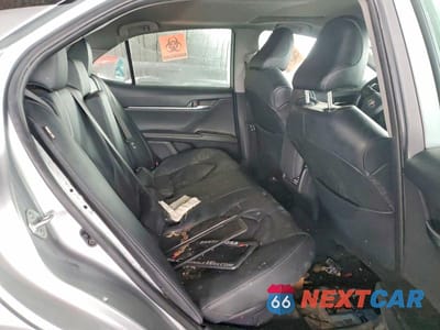 Zdjęcie 10 z 12 samochodu: 2022 TOYOTA CAMRY HYBRID XSE VIN:4T1K31AK3NU043894 - miniatura