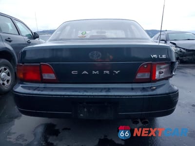 Zdjęcie 6 z 12 samochodu: 1995 TOYOTA CAMRY LE VIN:JT2GK12E1S0124877 - miniatura