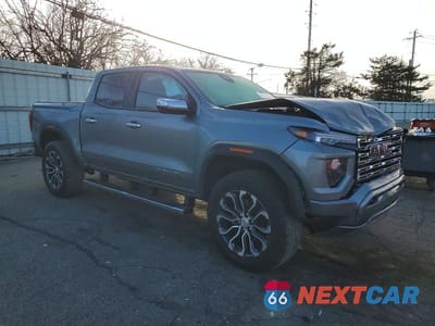 Czwarte zdjęcie samochodu z boku: 2025 GMC CANYON DENALI VIN:1GTP2FEK0S1243603 - miniatura