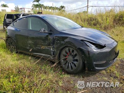 Czwarte zdjęcie samochodu z boku: 2023 TESLA MODEL Y VIN:7SAYGDEF6PF666975 - miniatura