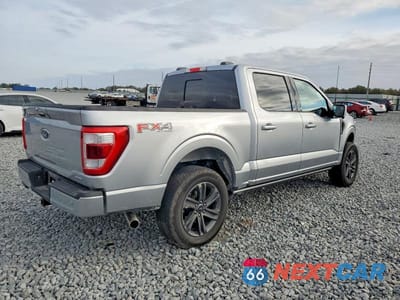 Trzecie zdjęcie samochodu z tyłu: 2023 FORD F150 SUPERCREW VIN:1FTFW1E82PFC02715 - miniatura