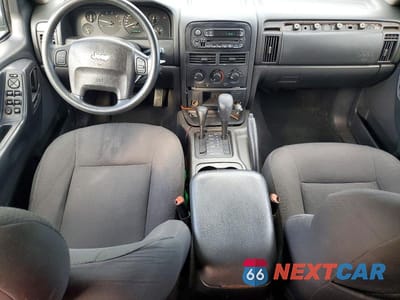 Zdjęcie 8 z 13 samochodu: 2004 JEEP GRAND CHEROKEE LAREDO VIN:1J4GW48S14C243812 - miniatura