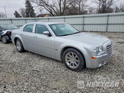 Czwarte zdjęcie samochodu z boku: 2005 CHRYSLER 300C VIN:2C3AA63H25H136076 - miniatura