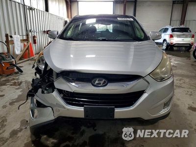 Piąte zdjęcie samochodu w środku: 2012 HYUNDAI TUCSON LIMITED VIN:KM8JUCAC3CU538347 - miniatura