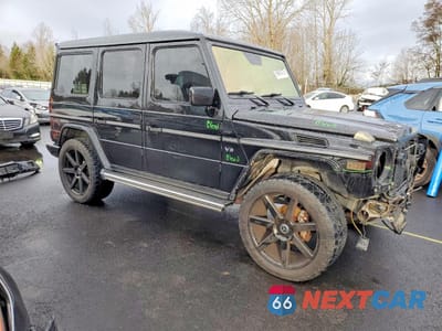 Czwarte zdjęcie samochodu z boku: 2002 MERCEDES-BENZ G 500 VIN:WDCYR49E02X133747 - miniatura