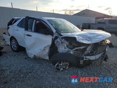 Czwarte zdjęcie samochodu z boku: 2022 CHEVROLET EQUINOX LT VIN:3GNAXUEV0NL102637 - miniatura