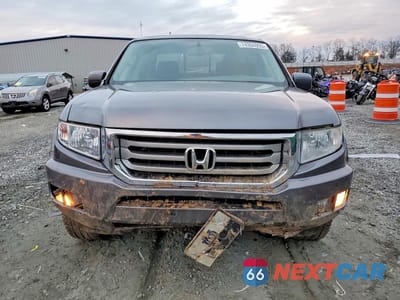 Piąte zdjęcie samochodu w środku: 2014 HONDA RIDGELINE RTL VIN:5FPYK1F55EB002994 - miniatura
