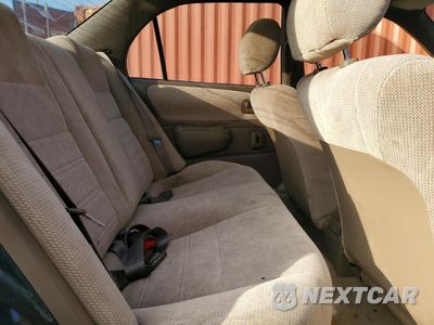 Zdjęcie 10 z 13 samochodu: 1997 TOYOTA COROLLA DX VIN:1NXBB02E0VZ558387 - miniatura
