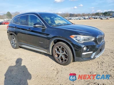 Czwarte zdjęcie samochodu z boku: 2016 BMW X1 XDRIVE28I VIN:WBXHT3C39G5E54994 - miniatura
