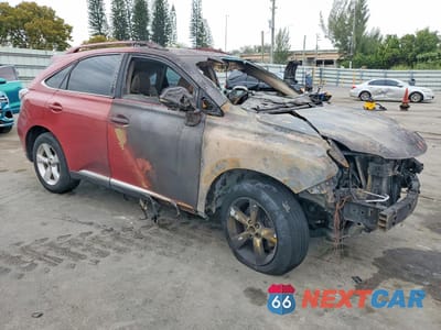 Czwarte zdjęcie samochodu z boku: 2011 LEXUS RX VIN:2T2BK1BA9BC088288 - miniatura