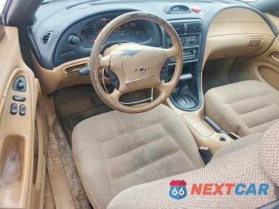 Zdjęcie 8 z 11 samochodu: 1997 FORD MUSTANG VIN:1FALP4047VF201438 - miniatura