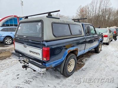 Trzecie zdjęcie samochodu z tyłu: 1987 FORD RANGER SUPER CAB VIN:1FTCR15T8HPB40652 - miniatura