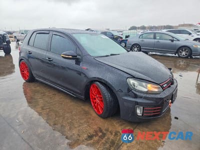 Czwarte zdjęcie samochodu z boku: 2013 VOLKSWAGEN GTI VIN:WVWHV7AJ7DW138089 - miniatura