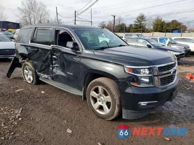 Czwarte zdjęcie samochodu z boku: 2019 CHEVROLET TAHOE K1500 LT VIN:1GNSKBKC1KR183744 - miniatura