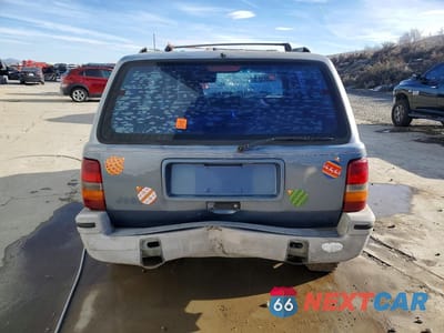 Zdjęcie 6 z 12 samochodu: 1995 JEEP GRAND CHEROKEE LAREDO VIN:1J4GZ58SXSC605565 - miniatura