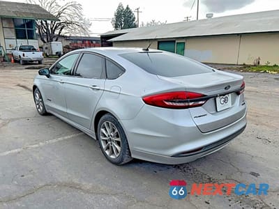 Trzecie zdjęcie samochodu z tyłu: 2017 FORD FUSION SE HYBRID VIN:3FA6P0LU4HR232655 - miniatura