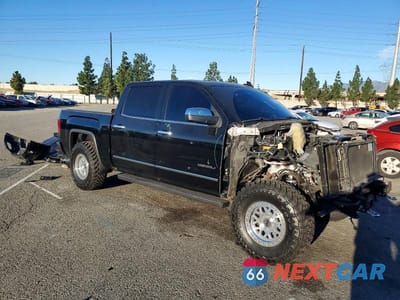 Czwarte zdjęcie samochodu z boku: 2018 GMC SIERRA K1500 DENALI VIN:3GTU2PEJ0JG351008 - miniatura