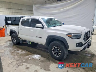 Czwarte zdjęcie samochodu z boku: 2023 TOYOTA TACOMA VIN:3TMCZ5AN2PM591031 - miniatura