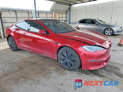 Czwarte zdjęcie samochodu z boku: 2023 TESLA MODEL S VIN:5YJSA1E56PF530033 - miniatura
