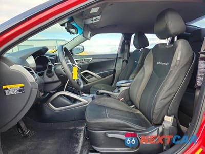 Zdjęcie 7 z 13 samochodu: 2013 HYUNDAI VELOSTER VIN:KMHTC6AD7DU154532 - miniatura