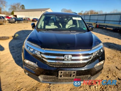 Piąte zdjęcie samochodu w środku: 2017 HONDA PILOT TOURING VIN:5FNYF6H97HB075492 - miniatura