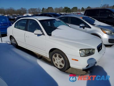 Czwarte zdjęcie samochodu z boku: 2001 HYUNDAI ELANTRA GLS VIN:KMHDN45D21U185325 - miniatura