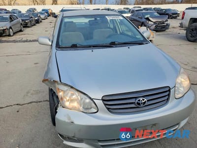 Piąte zdjęcie samochodu w środku: 2004 TOYOTA COROLLA CE VIN:JTDBR32E342042858 - miniatura
