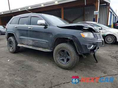 Czwarte zdjęcie samochodu z boku: 2015 JEEP GRAND CHEROKEE LIMITED VIN:1C4RJFBM2FC731849 - miniatura