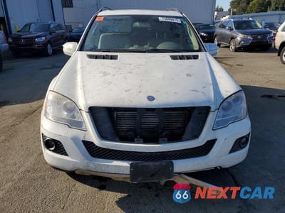 Piąte zdjęcie samochodu w środku: 2010 MERCEDES-BENZ ML 350 BLUETEC VIN:4JGBB2FB6AA612301 - miniatura
