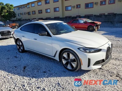 Czwarte zdjęcie samochodu z boku: 2023 BMW I4 EDRIVE 35 VIN:WBY43AW05PFR08357 - miniatura