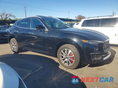 Czwarte zdjęcie samochodu z boku: 2019 MASERATI LEVANTE S LUXURY VIN:ZN661YUL2KX338664 - miniatura
