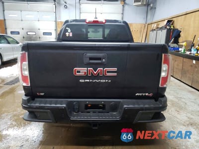 Zdjęcie 6 z 12 samochodu: 2022 GMC CANYON AT4 VIN:1GTG6FEN5N1146190 - miniatura