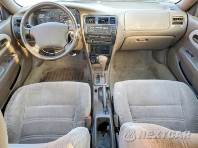 Zdjęcie 8 z 13 samochodu: 1997 TOYOTA COROLLA DX VIN:1NXBB02E0VZ558387 - miniatura