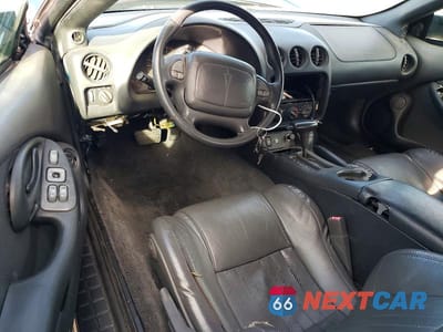 Zdjęcie 8 z 11 samochodu: 1997 PONTIAC GRAND AM VIN:2G2FV32P4V2205385 - miniatura