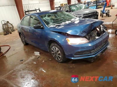 Czwarte zdjęcie samochodu z boku: 2016 VOLKSWAGEN JETTA S VIN:3VW267AJ1GM274304 - miniatura