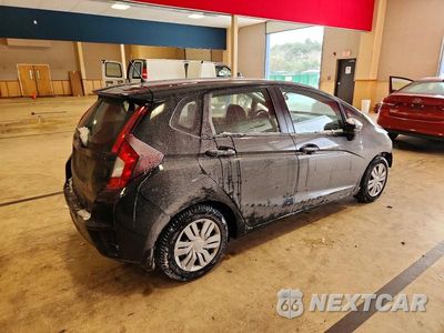 Piąte zdjęcie samochodu w środku: 2016 HONDA FIT LX VIN:JHMGK5H59GX014890 - miniatura