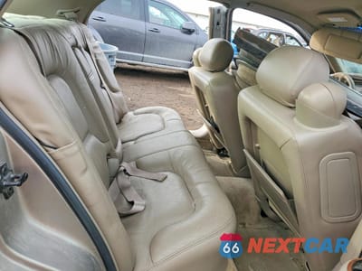 Zdjęcie 10 z 12 samochodu: 2000 BUICK PARK AVENUE VIN:1G4CW52K3Y4113934 - miniatura