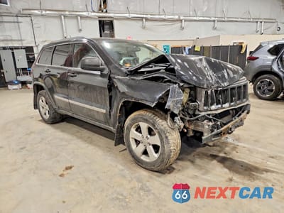 Czwarte zdjęcie samochodu z boku: 2011 JEEP GRAND CHEROKEE LAREDO VIN:1J4RR4GG4BC632082 - miniatura