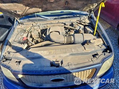 Zdjęcie 11 z 12 samochodu: 2003 FORD F150 VIN:1FTRW07L03KD83582 - miniatura