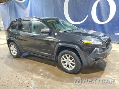 Czwarte zdjęcie samochodu z boku: 2016 JEEP CHEROKEE TRAILHAWK VIN:1C4PJMBS3GW224582 - miniatura