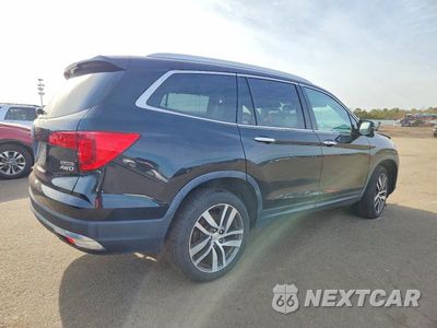 Trzecie zdjęcie samochodu z tyłu: 2017 HONDA PILOT TOURING VIN:5FNYF6H98HB061245 - miniatura