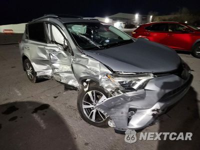 Czwarte zdjęcie samochodu z boku: 2017 TOYOTA RAV4 XLE VIN:2T3WFREV1HW345319 - miniatura