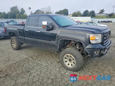 Czwarte zdjęcie samochodu z boku: 2014 GMC SIERRA K1500 SLT VIN:1GTV2VEC7EZ143448 - miniatura