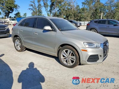 Czwarte zdjęcie samochodu z boku: 2017 AUDI Q3 PREMIUM VIN:WA1ECCFS3HR013074 - miniatura