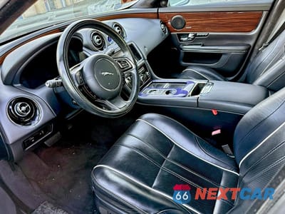 Piąte zdjęcie samochodu w środku: 2013 JAGUAR XJL PORTFOLIO VIN:SAJWA2GB2DLV42961 - miniatura